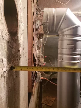 Wall snout connection for relining chimney