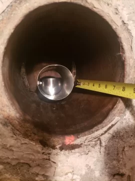 Wall snout connection for relining chimney