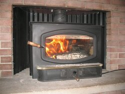 Does anyone "insulate" their masonry fireplace before installing an insert?