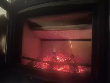 [Hearth.com] Creosote burning inside burn chamber