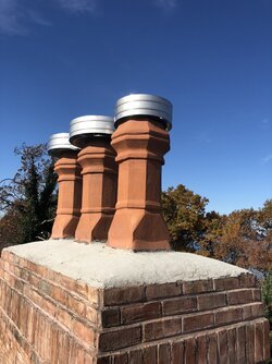 Cement Crown Chimney vs Stainless Steel Chimney