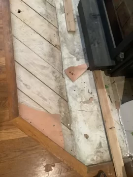 Tile over a floor protector?