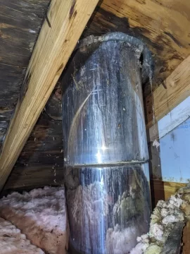 Pipe through the garage roof.jpg Pipe through the garage roof.jpg