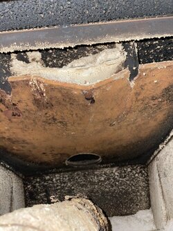 Cracked/warped metal inside woodstove