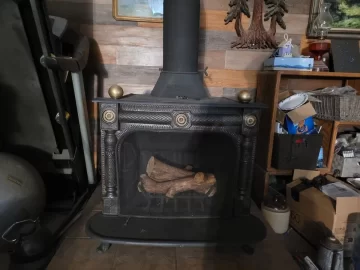 Desiring to install a Olympic 49 free Standing fire place . Its been  recently disabled, cleaned, and the seams revealed. | Hearth.com Forums Home