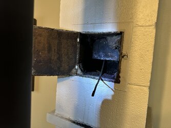 Chimney clean out not sealed.