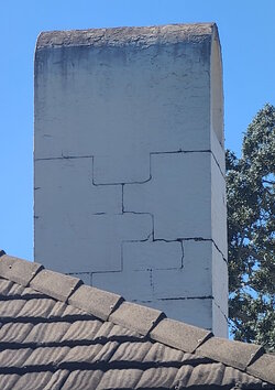 Chimney cinder blocks appearing through stucco