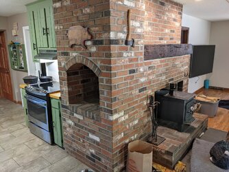 What would you do with this kitchen fireplace?