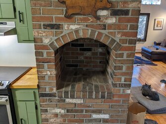 What would you do with this kitchen fireplace?