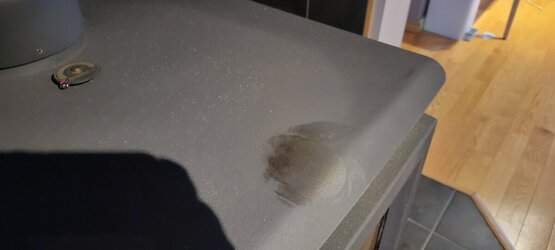 How to clean a melted stuffed toy stain off the top of Regency F3500?