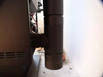 [Hearth.com] How to break the silicone attaching stove to pipe?