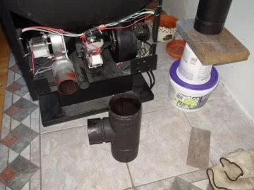 [Hearth.com] How to break the silicone attaching stove to pipe?