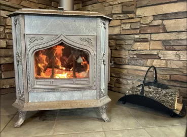 [Hearth.com] Wood stove in fireplace?