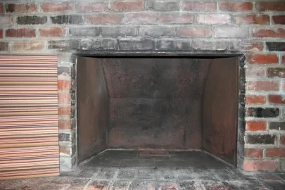[Hearth.com] Insert into a 1950's brick hearth / metal fireplace - how much bend in liner is ok?