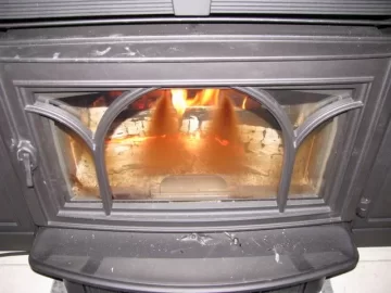 [Hearth.com] Cause of consisitent cone shaped glass stains on Jotul C 450 insert?
