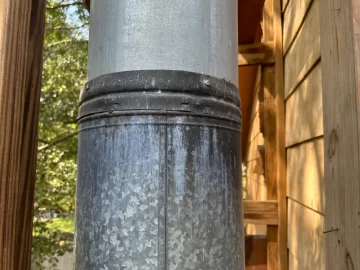[Hearth.com] Help Identifying old chimney system/advice about how to deal with Frankenstein-ed  chimney extension.