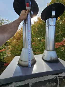 [Hearth.com] Backdraft through Hot Water Chimney