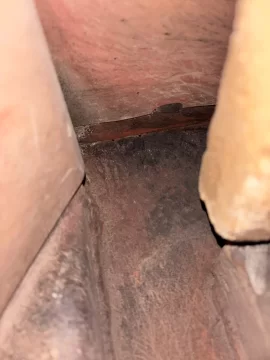 [Hearth.com] Two tiny holes in corner of insert?  Possible weld burn though?