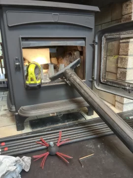 [Hearth.com] Is there a way for me to clean this chimney from inside?