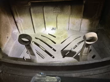 [Hearth.com] Defiant Encore grate warping.