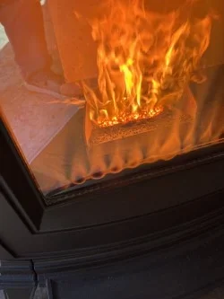 [Hearth.com] HARMAN 63 Flames coming out of the bottom sides of the burn pot