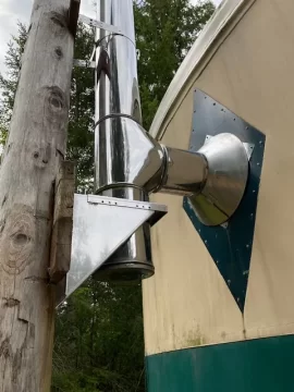 [Hearth.com] Old woodstove in yurt wall