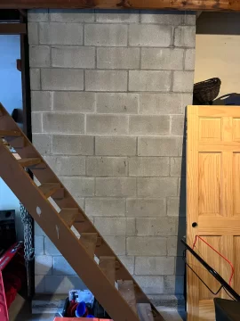 [Hearth.com] Hairline cracks in back of chimney.