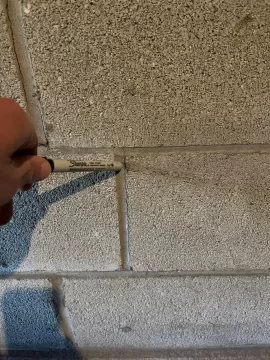 [Hearth.com] Hairline cracks in back of chimney.