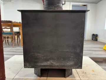 [Hearth.com] Step-top steel box stove ID — pinwheel draft caps + brass filigree
