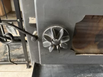 [Hearth.com] Step-top steel box stove ID — pinwheel draft caps + brass filigree