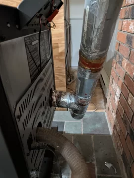 [Hearth.com] Weird vent pipe install, could use advise