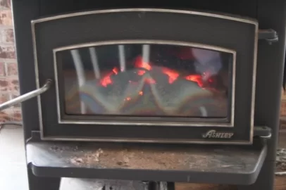 [Hearth.com] Cause of consisitent cone shaped glass stains on Jotul C 450 insert?