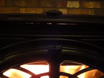 [Hearth.com] Light leaking Jotul - orange stripe below top plate