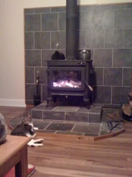 [Hearth.com] suggestions on how to raise Jotul F100 a few inches off stove board?