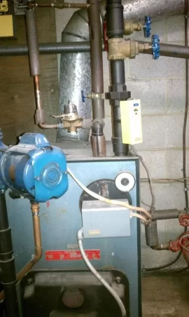 [Hearth.com] Tankless water heater next to electric hot water heater??