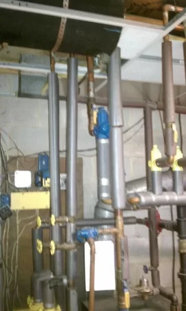 [Hearth.com] Tankless water heater next to electric hot water heater??