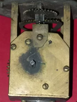[Hearth.com] Found a Wind up movement that revolves a kettle.