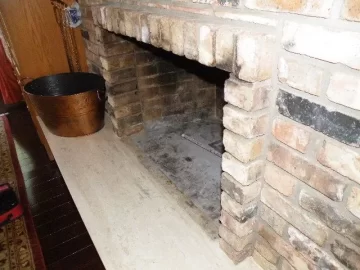 [Hearth.com] Best Way to Make Protruding Bricks Flush with Hearth?