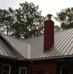 Install stove in this roof valley? Or near it....