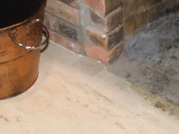 [Hearth.com] Best Way to Make Protruding Bricks Flush with Hearth?