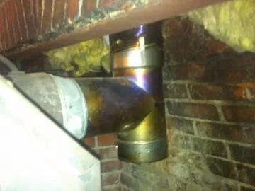[Hearth.com] Cut metal piece in fireplace??