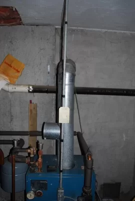 [Hearth.com] Is this ash leaking from vent pipe on my Oil Burning Furnace