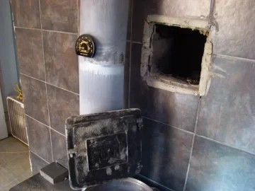 [Hearth.com] Cleanout Door keeps falling out of opening