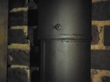 [Hearth.com] Sooty Blow-by....adjustable sleeved venting pipe section.....