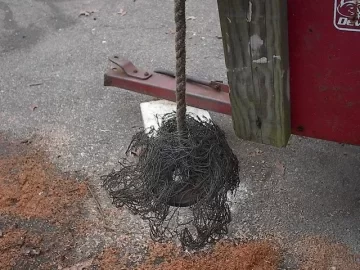 [Hearth.com] Chimney sweeping with a rock in a sock