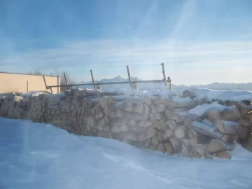 [Hearth.com] Does it really help to stack  wood in a windy area, pics