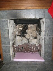 Insert vs. wood stove.  What will fit/work the best?