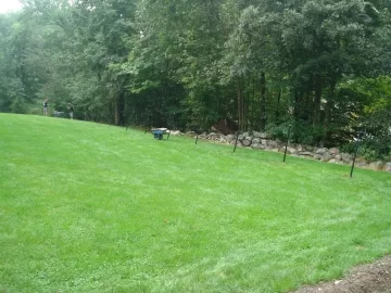 [Hearth.com] Chain link fence post.