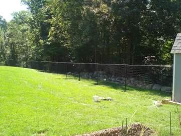 [Hearth.com] Chain link fence post.
