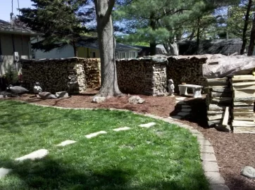 [Hearth.com] Back yard wood stacks and fresh mulch